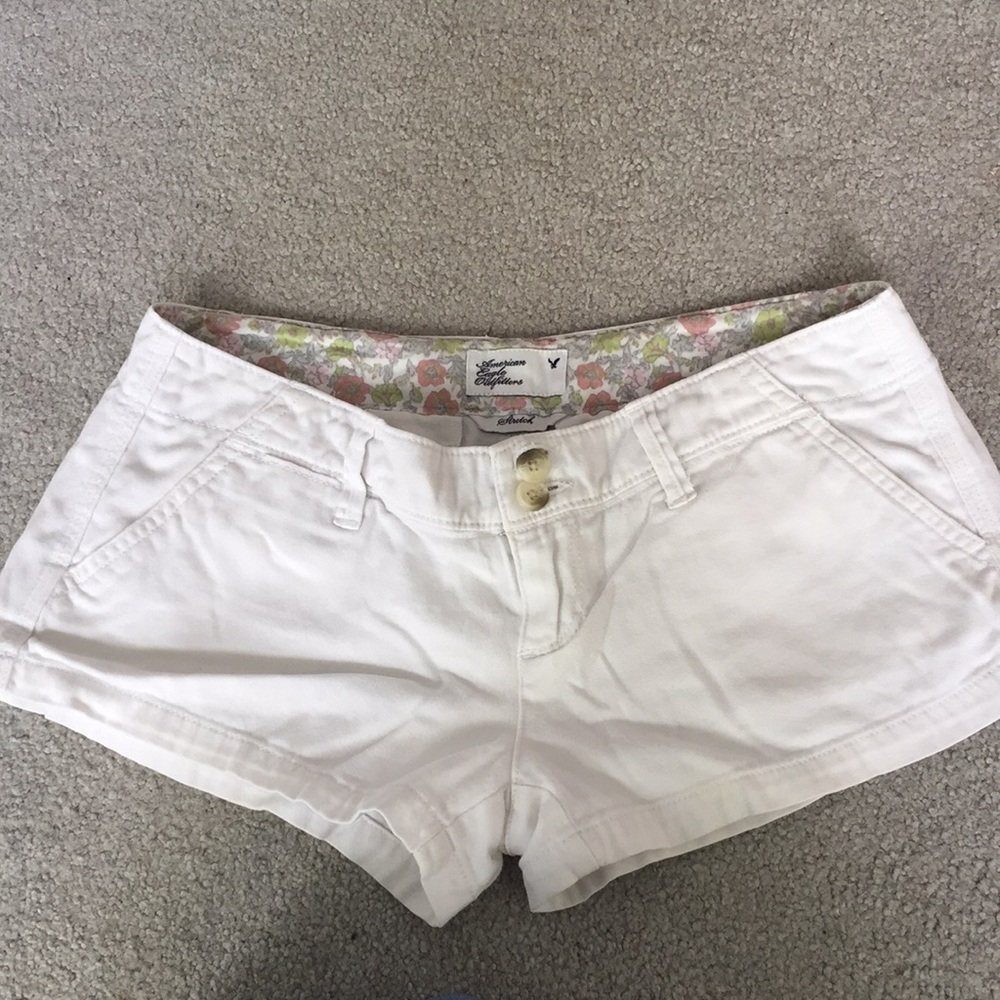 White stretch American eagle shorts
